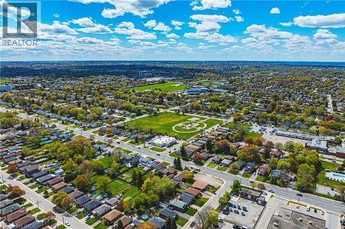 Expansive aerial view showcasing a residential neighborhood with numerous homes and mature trees - 242 East 43Rd Street, Hamilton, ON - Outdoor With View