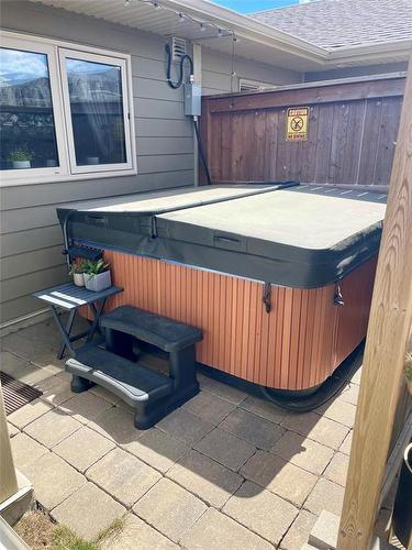 Relax in the outdoor Hot tub after a long day - 2 Birchwood Drive, Brandon, MB - Outdoor With Exterior