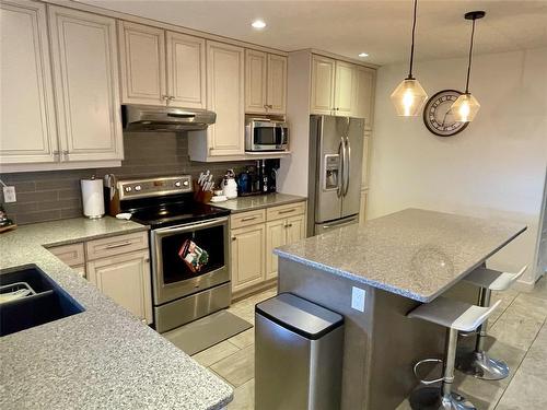 2 Birchwood Drive, Brandon, MB - Indoor Photo Showing Kitchen With Stainless Steel Kitchen With Double Sink