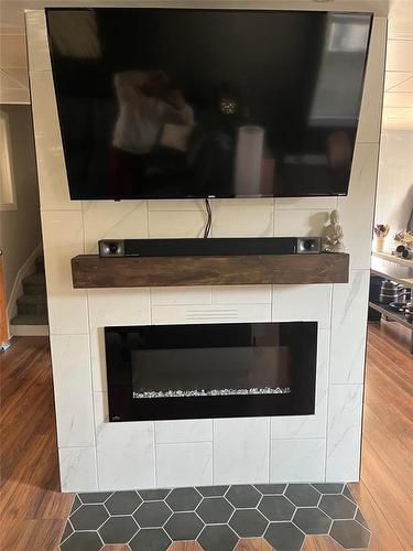 537 3Rd Street, Brandon, MB - Indoor With Fireplace