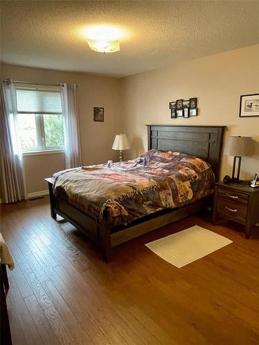 Hugh Primary bedroom - 10 Falcon Place, Brandon, MB 