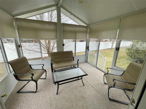 Lovely 3 season sunroom with blinds to keep out sun when needed - 10 Falcon Place, Brandon, MB 