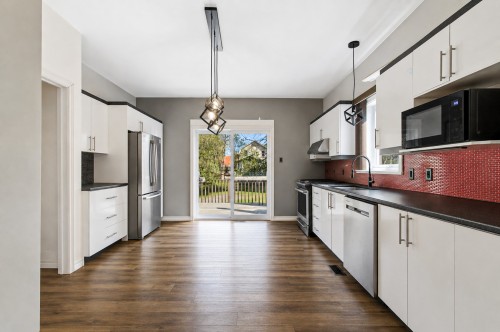 Cuisine - 49  - 51 Rue Charles, Lachute, QC - Indoor Photo Showing Kitchen