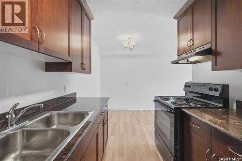 104 2233 St Henry Avenue, Saskatoon, SK - Indoor Photo Showing Kitchen With Double Sink