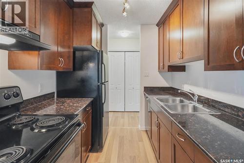 104 2233 St Henry Avenue, Saskatoon, SK - Indoor Photo Showing Kitchen With Double Sink