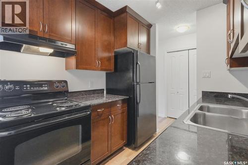 104 2233 St Henry Avenue, Saskatoon, SK - Indoor Photo Showing Kitchen With Double Sink