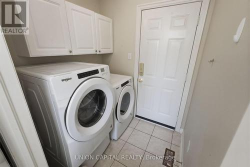 MAIN FLOOR LAUNDRY - 33 Eakin Mill Road, Markham, ON - Indoor Photo Showing Laundry Room