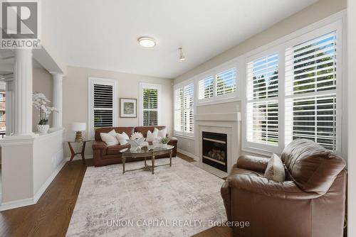 FAMILY ROOM - 33 Eakin Mill Road, Markham, ON - Indoor Photo Showing Living Room With Fireplace