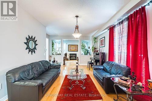 3598 Fountain Park Avenue, Mississauga, ON - Indoor Photo Showing Living Room With Fireplace
