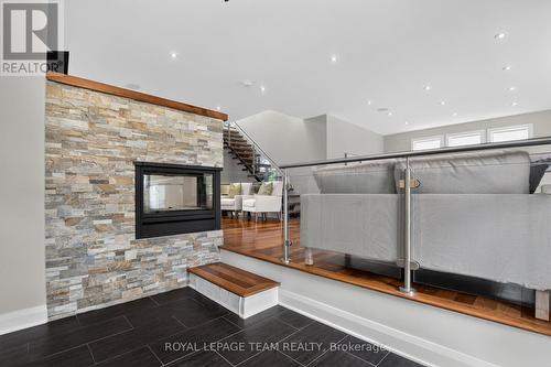 33 Gould Street, Ottawa, ON - Indoor Photo Showing Other Room With Fireplace