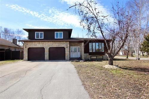 77 Guymer Front Street View - 77 Guymer Crescent, The Pas, MB - Outdoor With Facade
