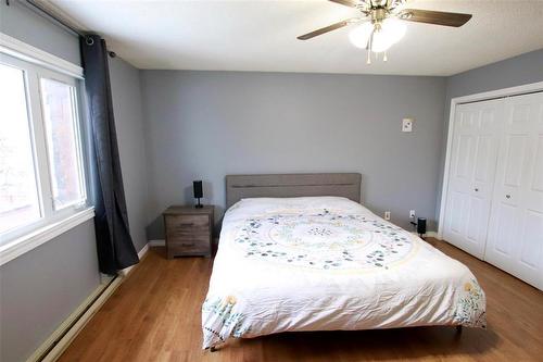 Primary Bedroom w2 Pce Ensuite - 77 Guymer Crescent, The Pas, MB - Indoor Photo Showing Bedroom