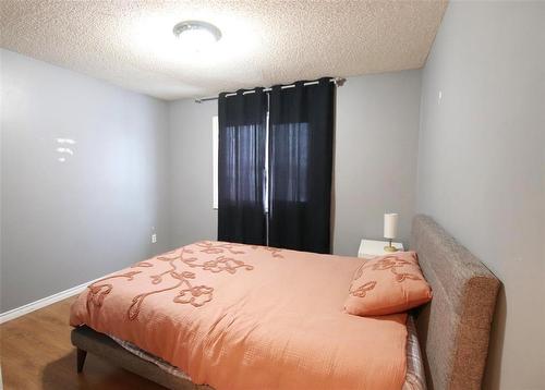 Upper level Bdrm #2 - 77 Guymer Crescent, The Pas, MB - Indoor Photo Showing Bedroom