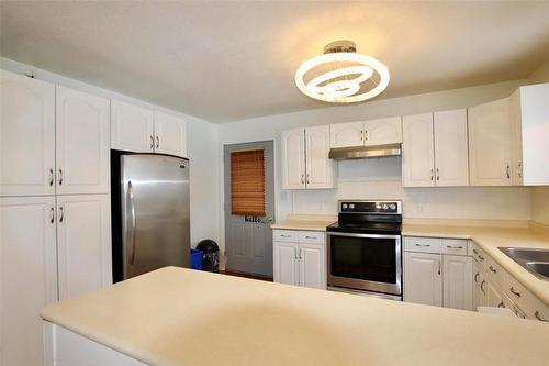 Kitchen - 77 Guymer Crescent, The Pas, MB - Indoor Photo Showing Kitchen With Double Sink