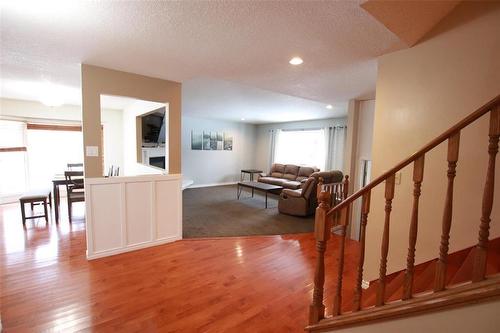 Main Hall;  Staircase to upper level - 77 Guymer Crescent, The Pas, MB - Indoor Photo Showing Other Room