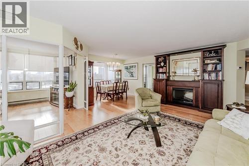 6 Willow Street Unit# 802, Waterloo, ON - Indoor Photo Showing Living Room With Fireplace