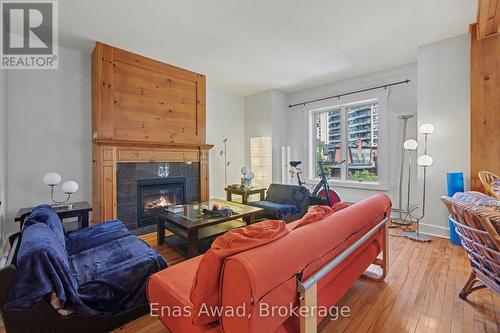 2 - 12 Somerset Street W, Ottawa, ON - Indoor Photo Showing Living Room With Fireplace