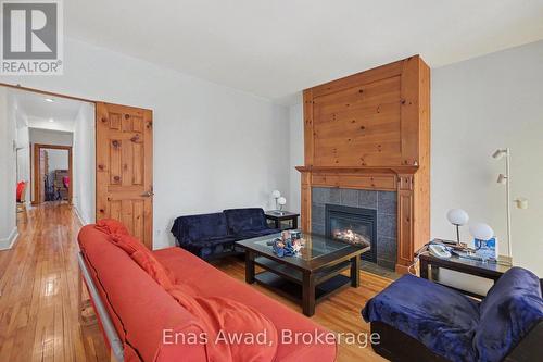 2 - 12 Somerset Street W, Ottawa, ON - Indoor Photo Showing Living Room With Fireplace