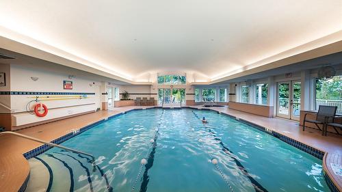 29-3800 Gallaghers Pinnacle Way, Kelowna, BC - Indoor Photo Showing Other Room With In Ground Pool