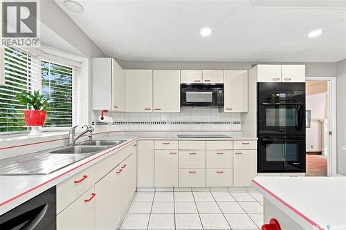 3230 Calder Terrace, Saskatoon, SK - Indoor Photo Showing Kitchen With Double Sink