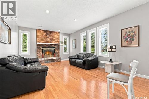 3230 Calder Terrace, Saskatoon, SK - Indoor Photo Showing Living Room With Fireplace