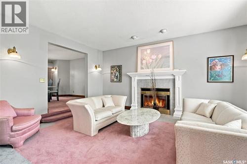 3230 Calder Terrace, Saskatoon, SK - Indoor Photo Showing Living Room With Fireplace