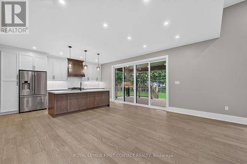 Kitchen and covered deck - Upper - 933 7Th Line, Innisfil, ON - Indoor Photo Showing Kitchen With Stainless Steel Kitchen