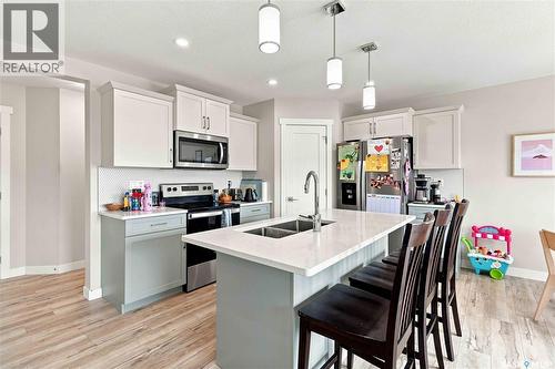 422 Myles Heidt Manor, Saskatoon, SK - Indoor Photo Showing Kitchen With Stainless Steel Kitchen With Double Sink With Upgraded Kitchen