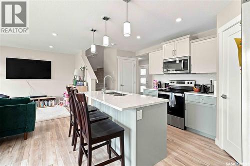422 Myles Heidt Manor, Saskatoon, SK - Indoor Photo Showing Kitchen With Stainless Steel Kitchen With Double Sink With Upgraded Kitchen