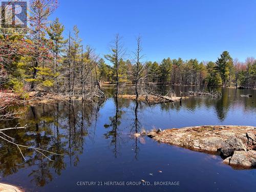 2355 Raymo Road, Frontenac (Frontenac Centre), ON - Outdoor With Body Of Water With View