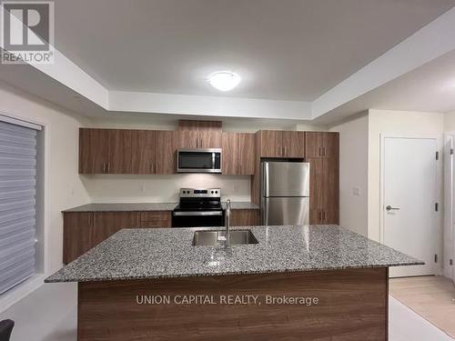 20 - 10 Liben Way, Toronto, ON - Indoor Photo Showing Kitchen With Double Sink