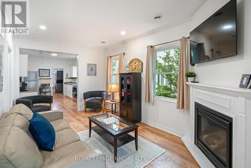 310 Eastwood Avenue, Fort Erie (Crystal Beach), ON - Indoor Photo Showing Living Room With Fireplace