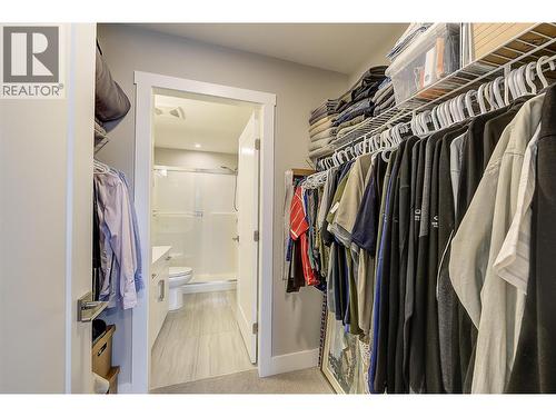 Walk through closet - 3090 Burtch Road Unit# 201, Kelowna, BC - Indoor Photo Showing Bedroom