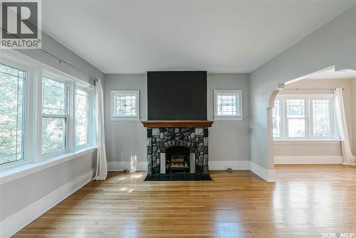 903 10Th Street E, Saskatoon, SK - Indoor Photo Showing Living Room With Fireplace