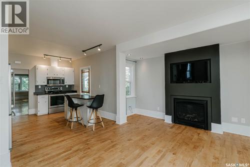 903 10Th Street E, Saskatoon, SK - Indoor Photo Showing Living Room With Fireplace