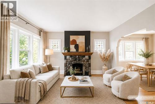 903 10Th Street E, Saskatoon, SK - Indoor Photo Showing Living Room With Fireplace