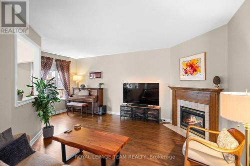 32 Trump Avenue, Ottawa, ON - Indoor Photo Showing Living Room With Fireplace