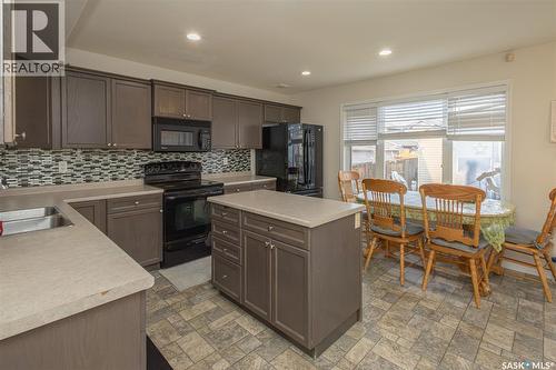 483 Coad Manor, Saskatoon, SK - Indoor Photo Showing Kitchen With Double Sink
