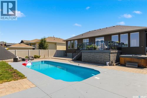 6024 Little Pine Loop, Regina, SK - Outdoor With In Ground Pool With Deck Patio Veranda