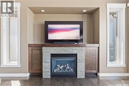 6024 Little Pine Loop, Regina, SK - Indoor Photo Showing Living Room With Fireplace