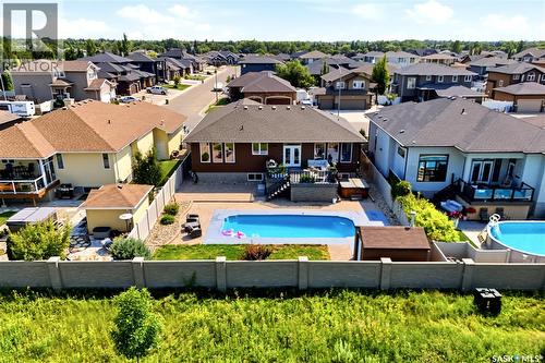 6024 Little Pine Loop, Regina, SK - Outdoor With In Ground Pool