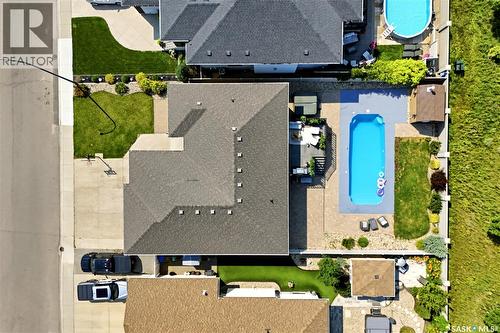 6024 Little Pine Loop, Regina, SK - Outdoor With In Ground Pool