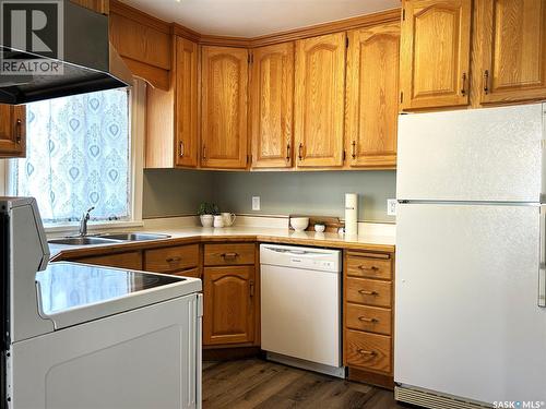 317 108Th Street W, Saskatoon, SK - Indoor Photo Showing Kitchen With Double Sink