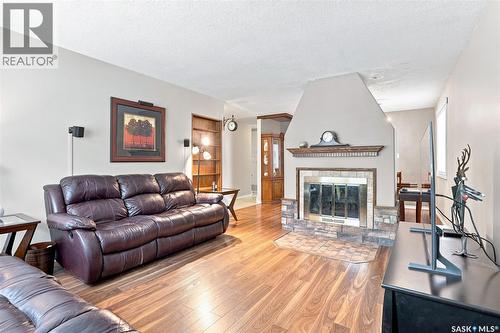 3008 Eastview, Saskatoon, SK - Indoor Photo Showing Living Room With Fireplace