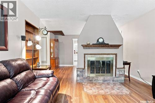 3008 Eastview, Saskatoon, SK - Indoor Photo Showing Living Room With Fireplace