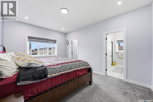 411 Schmeiser Bend, Saskatoon, SK - Indoor Photo Showing Bedroom