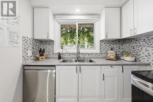 312 Upper Paradise Road, Hamilton, ON - Indoor Photo Showing Kitchen With Double Sink
