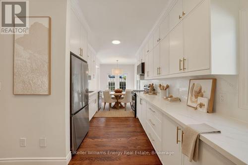 Virtually Staged Photo - 56 Elmdale Drive, Prince Edward County (Wellington), ON - Indoor Photo Showing Kitchen