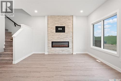 2973 Green Turtle Road, Regina, SK - Indoor With Fireplace