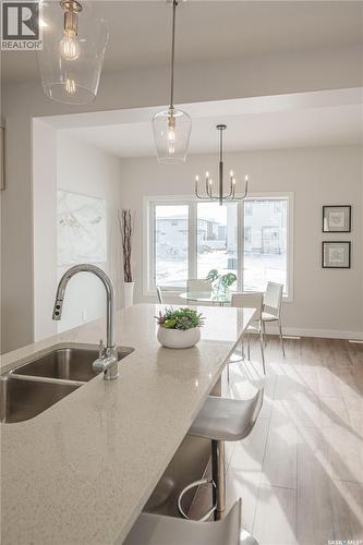 2972 Green Turtle Road, Regina, SK - Indoor Photo Showing Kitchen With Double Sink